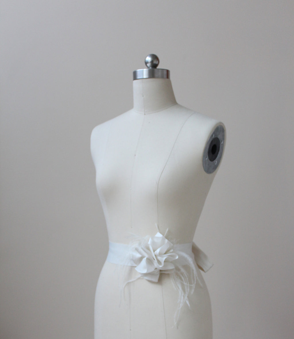 Style: MARILYN Feather Trimmed Silk Satin Organza Swirl Sash Belt - Peony Rice